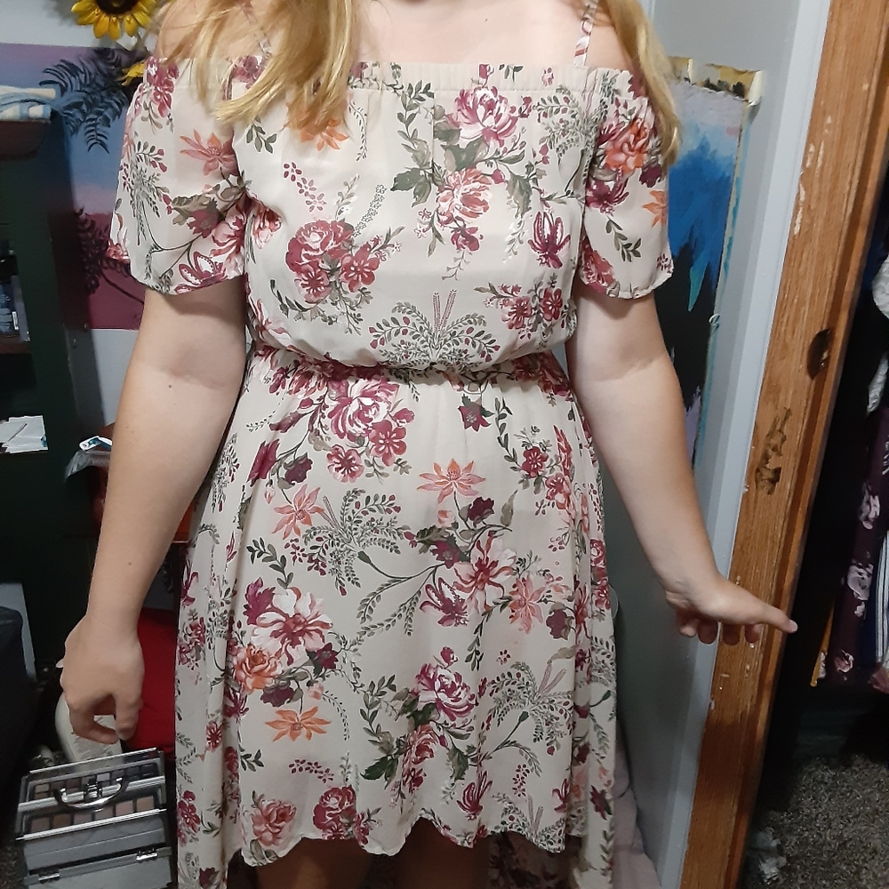 A dress. Short in front. Flowy in back. Medium